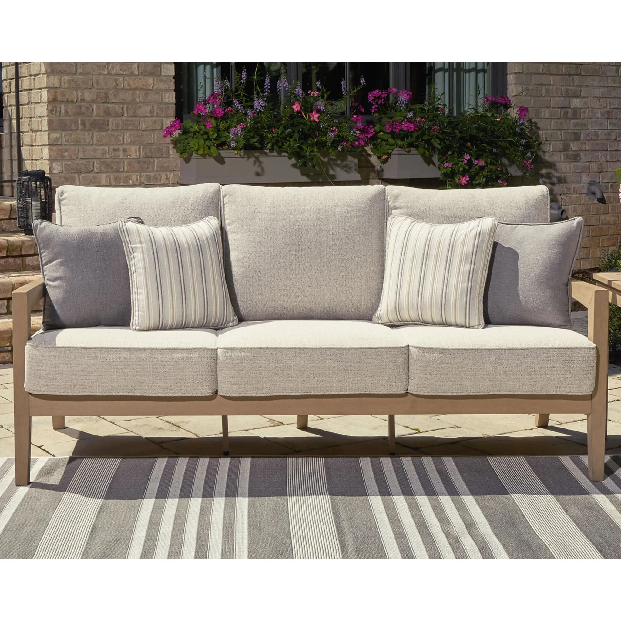 Hallow Creek Outdoor Sofa with Cushion - Driftwood